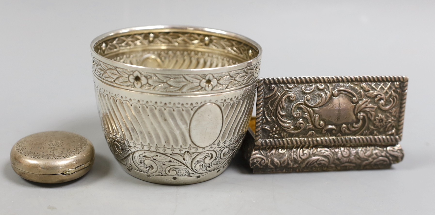 A late Victorian silver sugar bowl, London, 1897, diameter 90mm, a late Victorian silver trinket box and a Dutch white metal circular pill box.